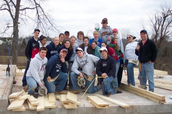 Better your community A group of volunteers completing home repairs for Habitat for Humanity of Bucks County in Chalfont, PA
